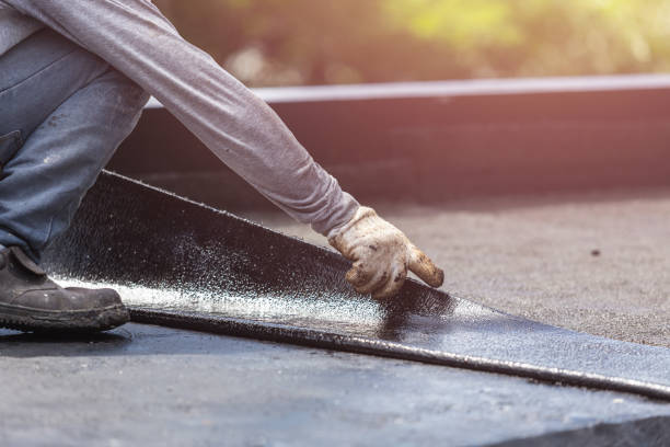 Professional Basement Waterproofing technician working in Woodlawn, VA